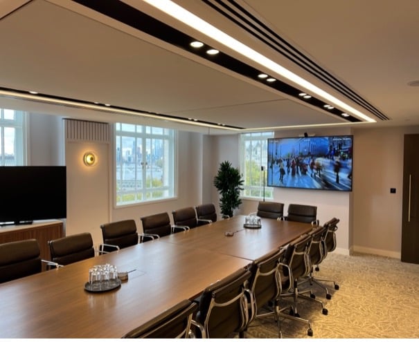 Divisble board room used for large open space communication and smaller meeting room requirements.